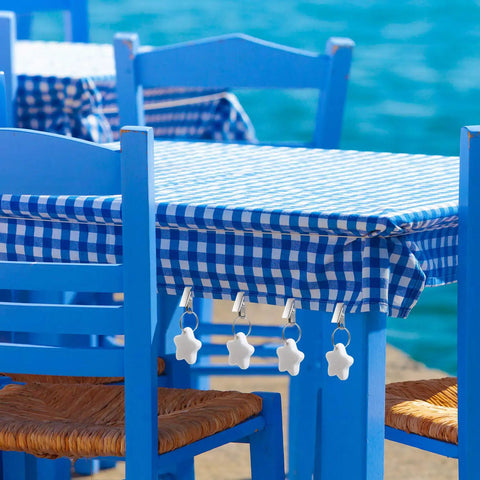 Starfish Tablecloth Weights Set With Metal Clips, Durable Table Cover Hangers for windy outdoor picnics, blue checkered cloth.