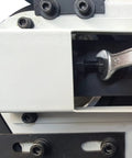 Close-up of the interior mechanism of a Rugged 4x48 Inch Industrial Belt Grinder With 76 Fps, showing the motor and adjustment tools.