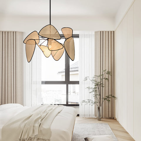 Bedroom scene with fan shaped pendant light with woven shade and silver finish, cozy ambiance.