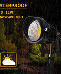 Warm White Outdoor Landscape Spotlight 12W 3000K IP65 Waterproof Garden Lighting in rain with cast aluminum housing.