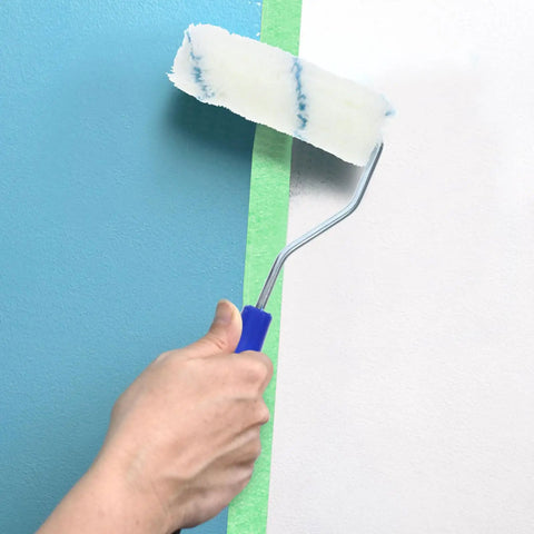 Pro Grade Paint Roller Kit With Solid Frame And Click Swap Sleeves For Flawless Wall Painting and Crisp Edging, applying blue paint.