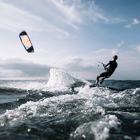 Kitesurfer riding waves with Two Airbags Wind Wing For Kitesurf And Wing Foil With Window Design Easy Setup Trainer Kite