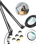 Big 8X Magnifying Glass With Light And Stand Clamp On LED Desk Lamp Arm 2 X 16 Inch Swivel 5 Color Modes shown in use
