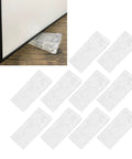 Transparent Door Stopper Set Of 10 Non Slip Holders shown under door, high friction quadrate shape, 4 by 9.4 cm, no tools needed