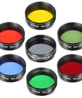 All In One 7 Piece 1.25 Inch Telescope Filter Kit For Planetary And Lunar Viewing Includes Red Orange Yellow Green Blue Eyepiece Filters Plus Moon ND96 Filter For 1.25in Eyepieces Perfect For Serious Stargazing. Set of seven colored filters displayed in circle formation.