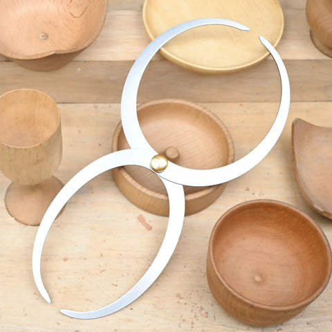 Slick Double Ended Bowl Calipers For Woodturning And Fine Jobs, stainless steel, 5.5in jaw span on wooden background.