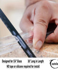 Person cutting Shower Door Bottom Seal With Drip Rail For 1/4 Inch Glass, 36 Inch Long Sweep, Ultra Clear Polycarbonate