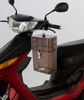 Built Tough Weatherproof Connector Box For Outdoor EV Chargers Drip Free Plug Socket Guard Black plastic housing mounted on scooter.