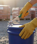 Heavy Duty Tough As Nails Multi Function Paint Pail Opener Alloy Drum Wrench with chunky non-slip handle opening blue paint bucket.