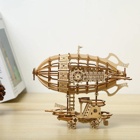 Epic 3D Wooden Airship Puzzle Kit For Adults on shelf, showcasing detailed miniature ship construction, wood model decor gift.