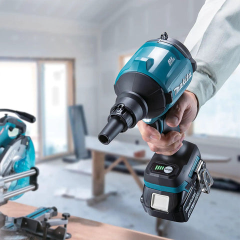 Bad Boy 18V Cordless Blower And Vacuum with Slick Nozzle Swap in hand, battery attached, working on debris removal.