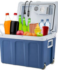Top Notch 48 Quart Electric Cooler And Warmer With Wheels Grab And Go Thermoelectric Portable Fridge filled with drinks and snacks.