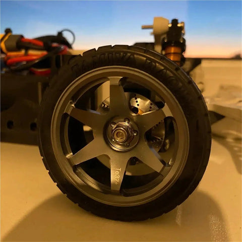 Heavy Duty Metal Brake Discs And Wheel Rim Kit For 1/10 On Road RC Cars, showing 12mm hex adapters in close-up view.