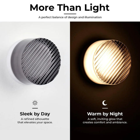 Modern Round LED Wall Sconce, 8W Smoke Grey Striped Glass Vanity Light on wall, showcasing sleek design and warm illumination.