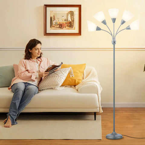 Living room setting with Five Head Floor Lamp With Adjustable Gooseneck Arms And Large Frosted Shade For E26 A19 Bulbs Silver Finish.