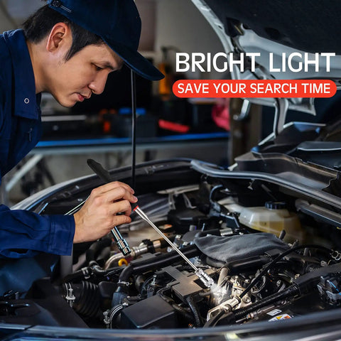Mechanic uses Telescoping Magnetic Tool Set With LED Light And Inspection Mirror for car engine repair
