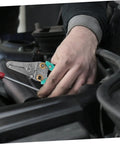 Heavy Duty Insulated Wire Strippers Pro Grade Electrical Pliers in hand, used for automotive repair and wiring tasks.