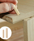 Inserting dowel from Pro Grade Walnut Wood Dowels Kit In Sizes One Quarter Inch Five Sixteenth Inch Three Eighth Inch Grooved Plugs 225 Pcs
