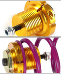 Close-up of Purple CNC Aluminum Suspension Coilover Sleeves Kit For 06-11 Honda Civic, showcasing gold locking perches and purple spring.