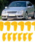 Six Pack Tire Changer Rim Protectors: Universal Wheel Edge Inserts in yellow, displayed in front of a silver car, durable plastic.