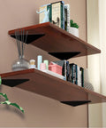 Four Pack Floating Shelf Brackets 4x3 Inch Hidden Triangle Design supporting wooden shelves with books and decor in modern room.
