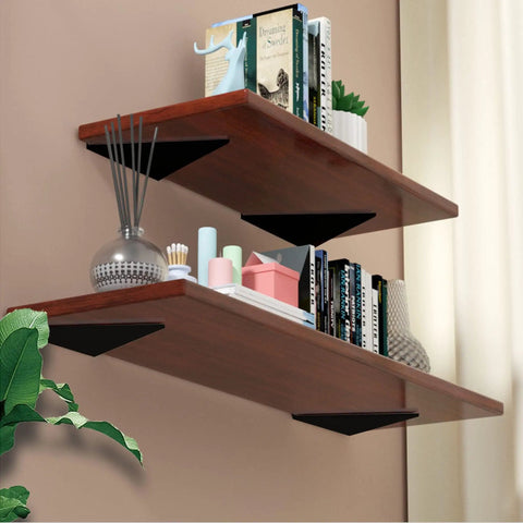 Four Pack Floating Shelf Brackets 4x3 Inch Hidden Triangle Design supporting wooden shelves with books and decor in modern room.