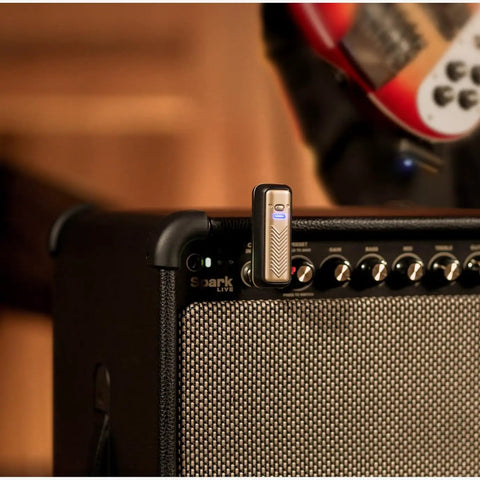 Wireless Guitar System With Rock-Solid 2.4G Transmission, 24-Bit/48kHz Audio plugged into amp with low latency under 3ms