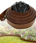 Pro Grade Landscape Edging Kit 33 Foot Long By 4 Inch High Flexible Plastic No Dig Border With 30 Spikes Easy Install shown in garden