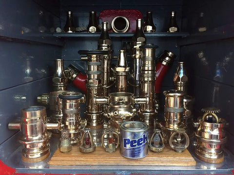 Assorted metal fittings with a can of Multipurpose All In One Metal Cleaner And Polish For Chrome Aluminum Silverware Glass And Fiberglass Cleans Shines And Protects All Metals Fiberglass And Acrylics Home And Industrial Use 1000ml Can displayed.