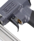 Hella Smooth Silent Air Nailer With Anti Jam Baffle For Dead Easy Reloads Handles Zero Point Four To Point Eight Mpa Pressure Like A Boss For Floor Framing Decking And Roofing Jobs close-up of trigger mechanism and air inlet