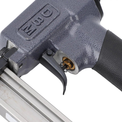 Hella Smooth Silent Air Nailer With Anti Jam Baffle For Dead Easy Reloads Handles Zero Point Four To Point Eight Mpa Pressure Like A Boss For Floor Framing Decking And Roofing Jobs close-up of trigger mechanism and air inlet