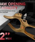 T Style 400A Heavy Duty Brass Welding Ground Clamp clamping 2 inch thick metal plate with curved jaws and beefy spring tension