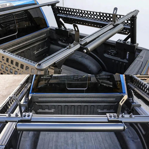 Built Tough 23.5 Inch Powder Coated Aluminum Ladder Roller With T Slot Compatibility For Roof Racks And Pickup Trucks in use, mounted in truck bed.