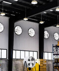 Heavy Hitter Industrial Turbine Fan That Goes Hard With Top Notch Ventilation And A Smooth Exhaust Setup Featuring Six Blades For Wide Angle Cooling Across Workshops And Garages On Standard Residential Voltage installed in a warehouse.
