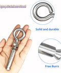 Beefy Heavy Duty 304 Stainless Steel Expansion Eyebolt shown resting on a hand, highlighting solid build with close-ups of design features.