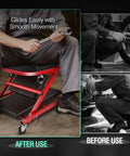 Beefy Low Profile Rolling Folding Mechanic Creeper Seat With Six Swivel Casters And Heavy Duty Steel Frame shown in use with tool.
