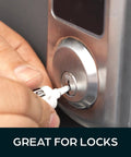 Applying Graphite Lock Lubricant With Precision Needle Applicator to a door lock for smooth, quiet, no mess operation.