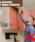 Person opening upper cabinet with sign "Not Suitable for Upper Cabinets" and red X mark, highlighting usage limitations.