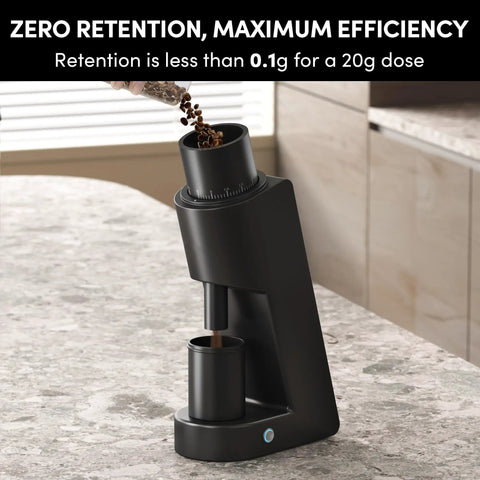 Rock Solid Single Dose Coffee Grinder With Brawny 38 Mm Conical Burrs And Butter Smooth Stepless Dial For Bold Espresso Pour Over Pulls Low Retention Anti Static Frame In Matte Black, pouring coffee beans.