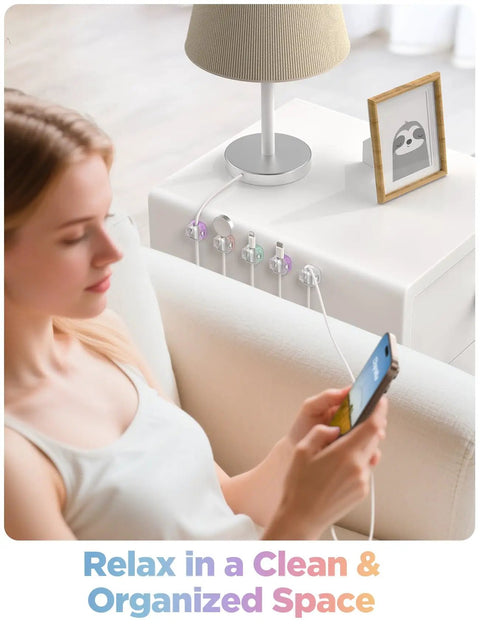 8 Pack Cable Clips Cord Organizer With One Hand Lock And Extra Strong Adhesive, installed on a nightstand keeping cords organized