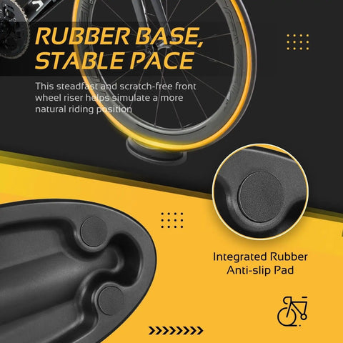 Close-up of a molded plastic front wheel riser block with rubber anti-slip pad, elevating a bike wheel for indoor turbo training.
