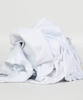 Bulk Cotton T Shirt Rags 5 Lb Box For Auto Shop Cleaning Low Lint Wiping Cloths piled up, white cotton material