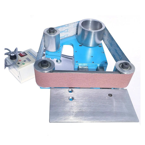 Badass Belt Sander And Grinder Featuring A Knockout 750W Brushless Motor With Precise Digital Controls, showcasing the sander's steel chassis and sanding belt.