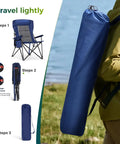 Person carrying oversized folding camping chair in bag showing setup steps for adults with high back support and cup holders