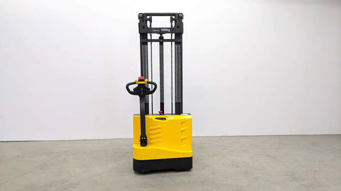 Heavy Duty Electric Thin Leg Pallet Stacker As A No Fuss Heavy Hitter With 2204 Lb Load Capacity And 130 Inch Lift Height featuring a yellow body and power steering.