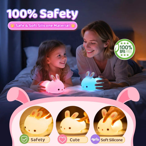 Mother and child enjoying Kawaii Squishy Bunny Night Light For Kids With 16 Colors LED Glow Soft Silicone Bunny Lamp Dimmable 1200mAh Battery Cute Baby Night Light Nursery Decor And Birthday Gift For Girls glowing softly at night.