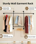 Heavy Duty Industrial Pipe Clothing Rack With Four Hanging Rods Wall Mounted Garment Rack Black Steel Frame with garments organized.