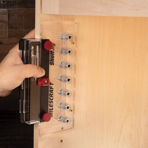Man using Shelf Pin Jig For Cabinets Create One Quarter Inch And Five Millimeter Shelf Holes With 32 Millimeter Spacing Detachable Fence