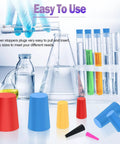 130 Pcs High Temp Silicone Rubber Stopper Set With 8 Sizes Tapered Plugs for Masking Systems Ideal for Powder Coating Painting and Anodizing Includes Color Coded Pink Black Red Yellow Blue Plugs shown with lab equipment.