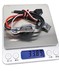 AM32 40A Crawler ESC With 5.2 To 8.2V BEC on digital scale displaying 33.89 grams